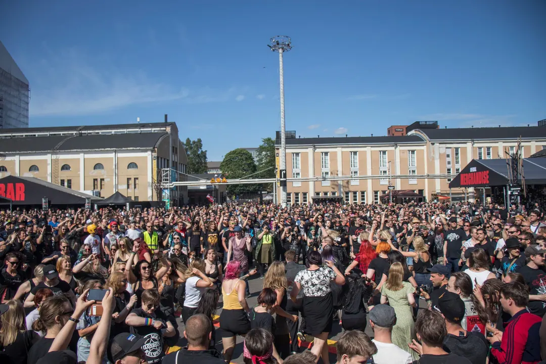 An all-women mosh pit at the Tuska metal festival in Helsinki, a crowd caught mid-motion