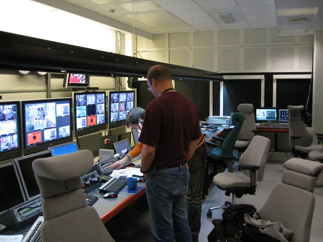 An engineer working at the Yle television monitoring desk
