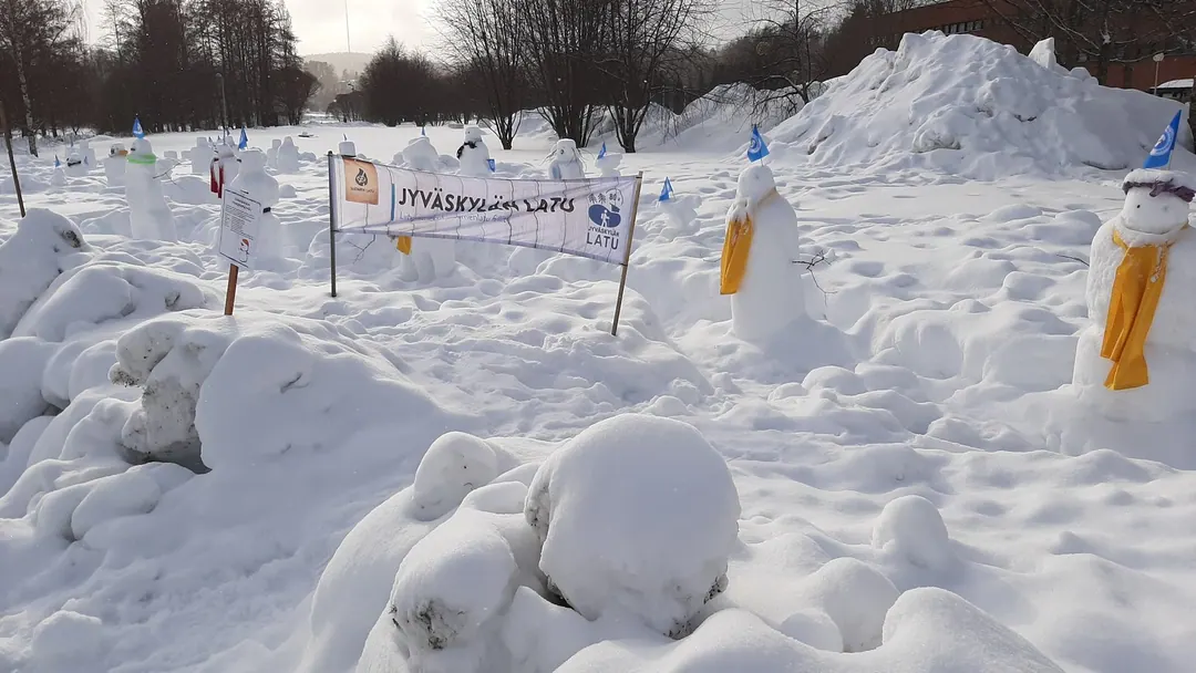 A row of snowmen built by a ski club in Jyvaskyla