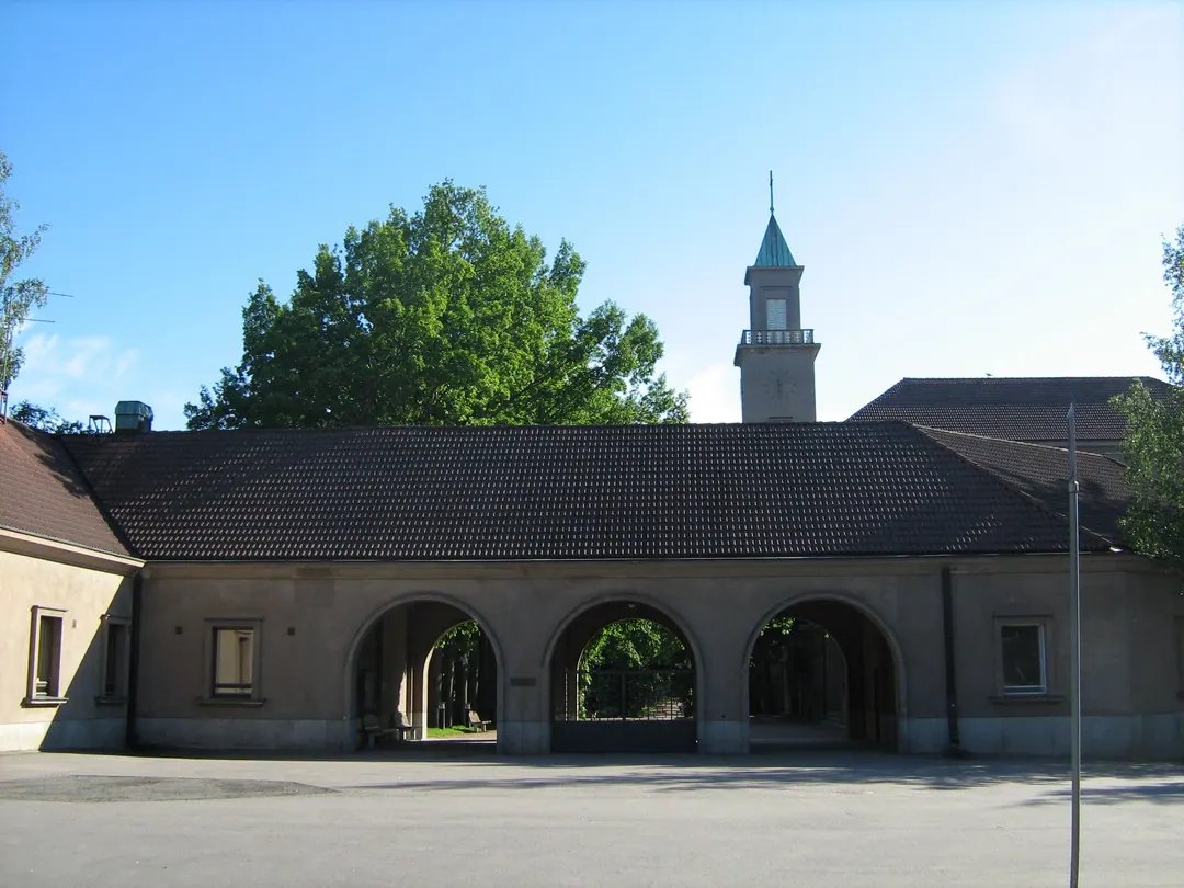 The stone and iron entrance to Hietaniemi cemetery in Helsinki