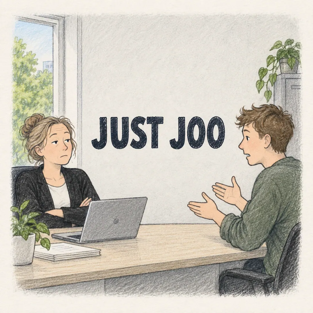 just joo - a woman listening to a colleague's excuse across an office desk with a completely flat expression
